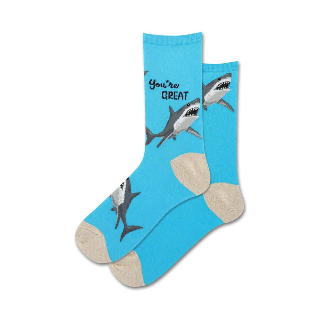 Blue socks with shark design and 'You're Great' text on a white background
