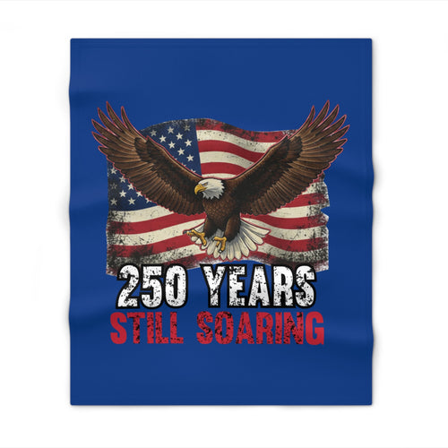 Fleece blanket with an eagle and American flag design on a blue background
