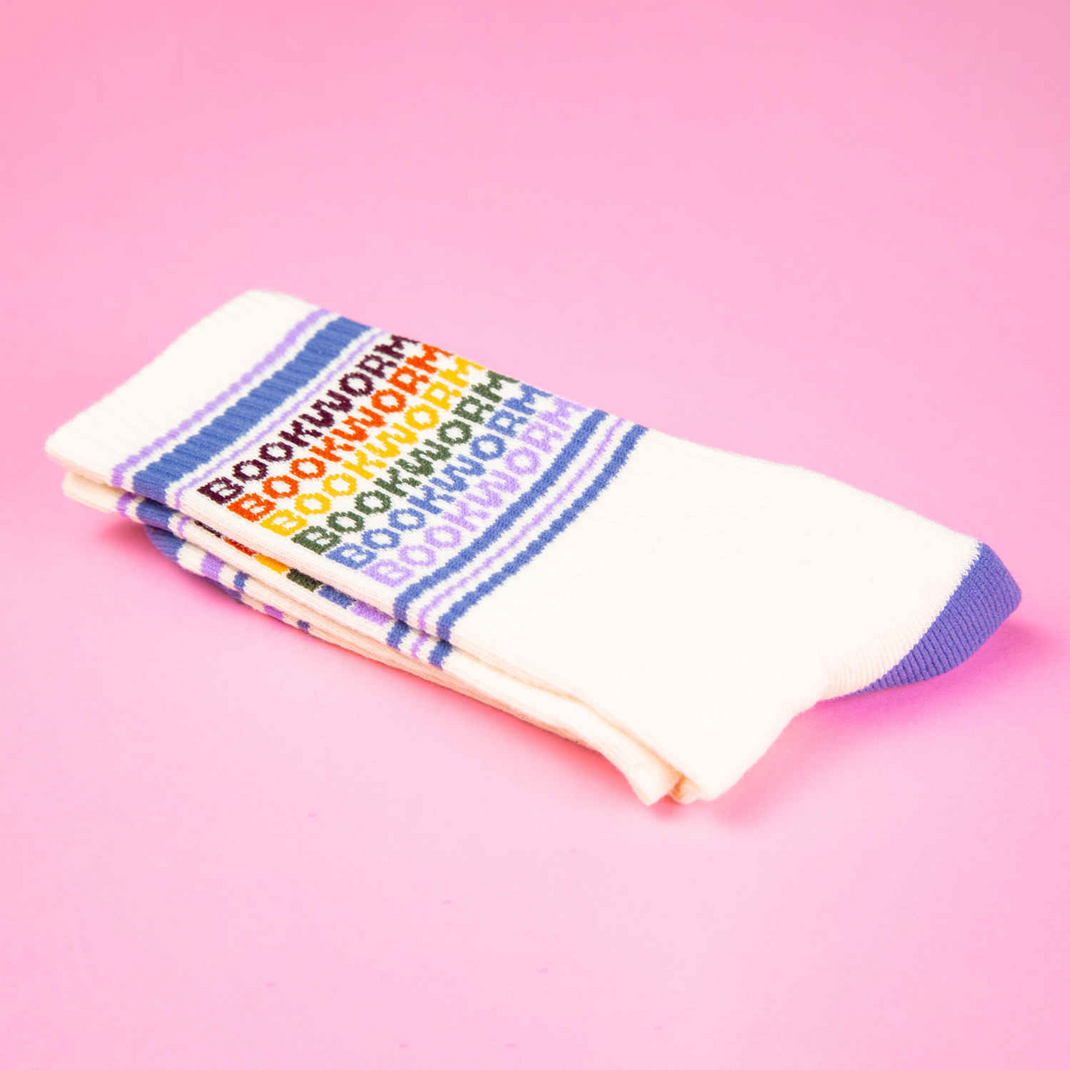 Colorful sock with 'Bookworm' text on a pink background