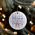 Decorative Christmas ornament with 'the year I learned Mahjong' text .
