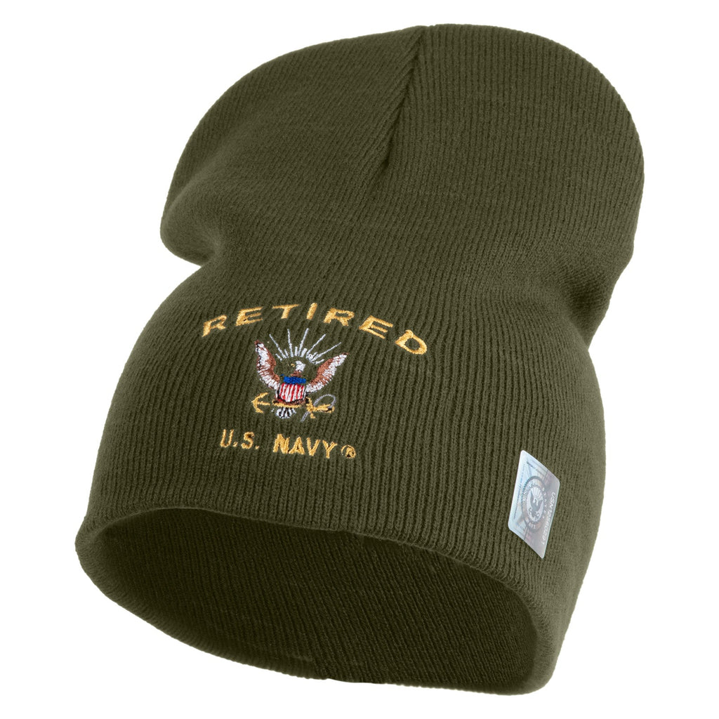 Green knit beanie with 'Retired U.S. Navy' embroidery on a white background