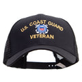 Black cap with 'U.S. Coast Guard Veteran' text and emblem on a white background