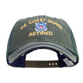 Green cap with U.S. Coast Guard Retired text and emblem on a white background