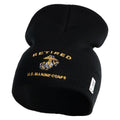 Black knit beanie with 'Retired U.S. Marine Corps' text and emblem on a white background