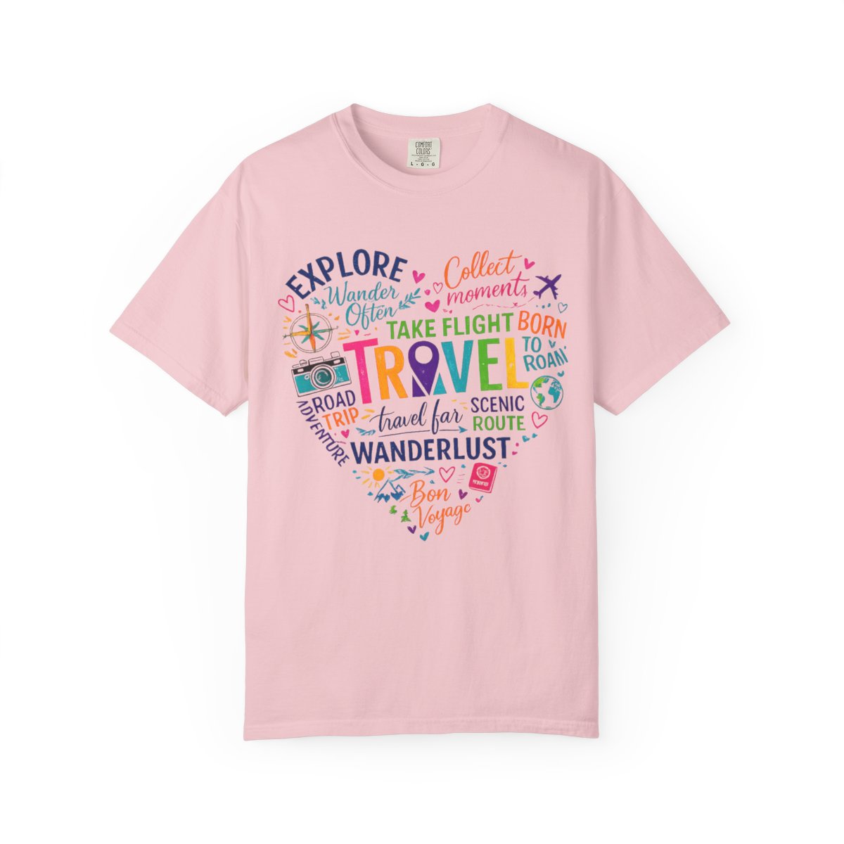 A light pink short-sleeve crewneck t-shirt featuring a colorful heart-shaped graphic on the chest with travel-themed text and illustrations.