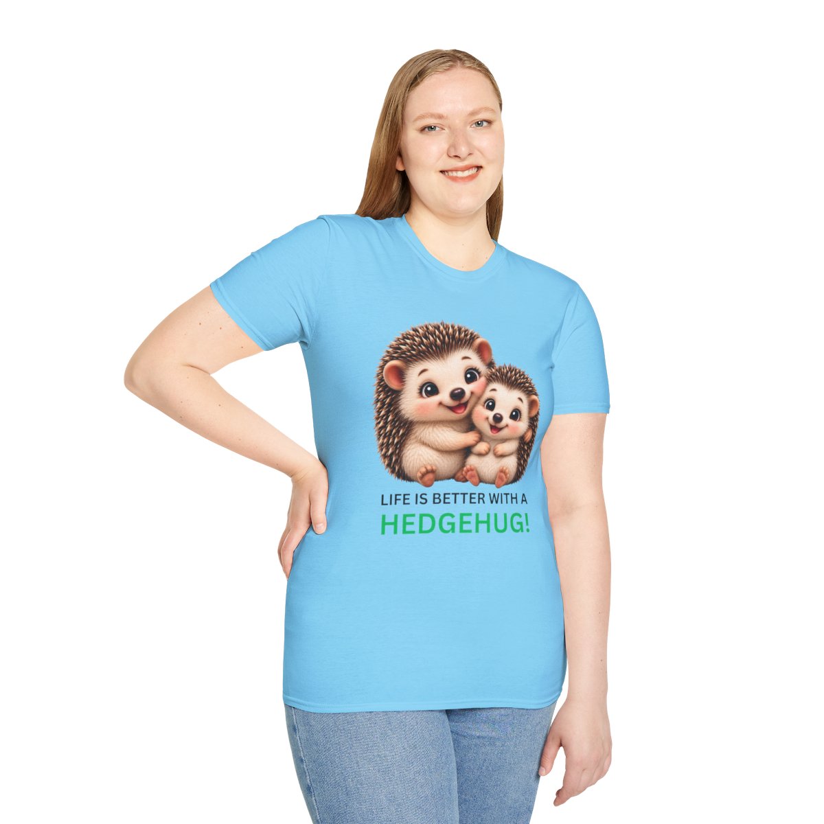A woman modeling a light blue short-sleeve t-shirt with a graphic of two cartoon hedgehogs and the text 'LIFE IS BETTER WITH A HEDGEHUG!'.