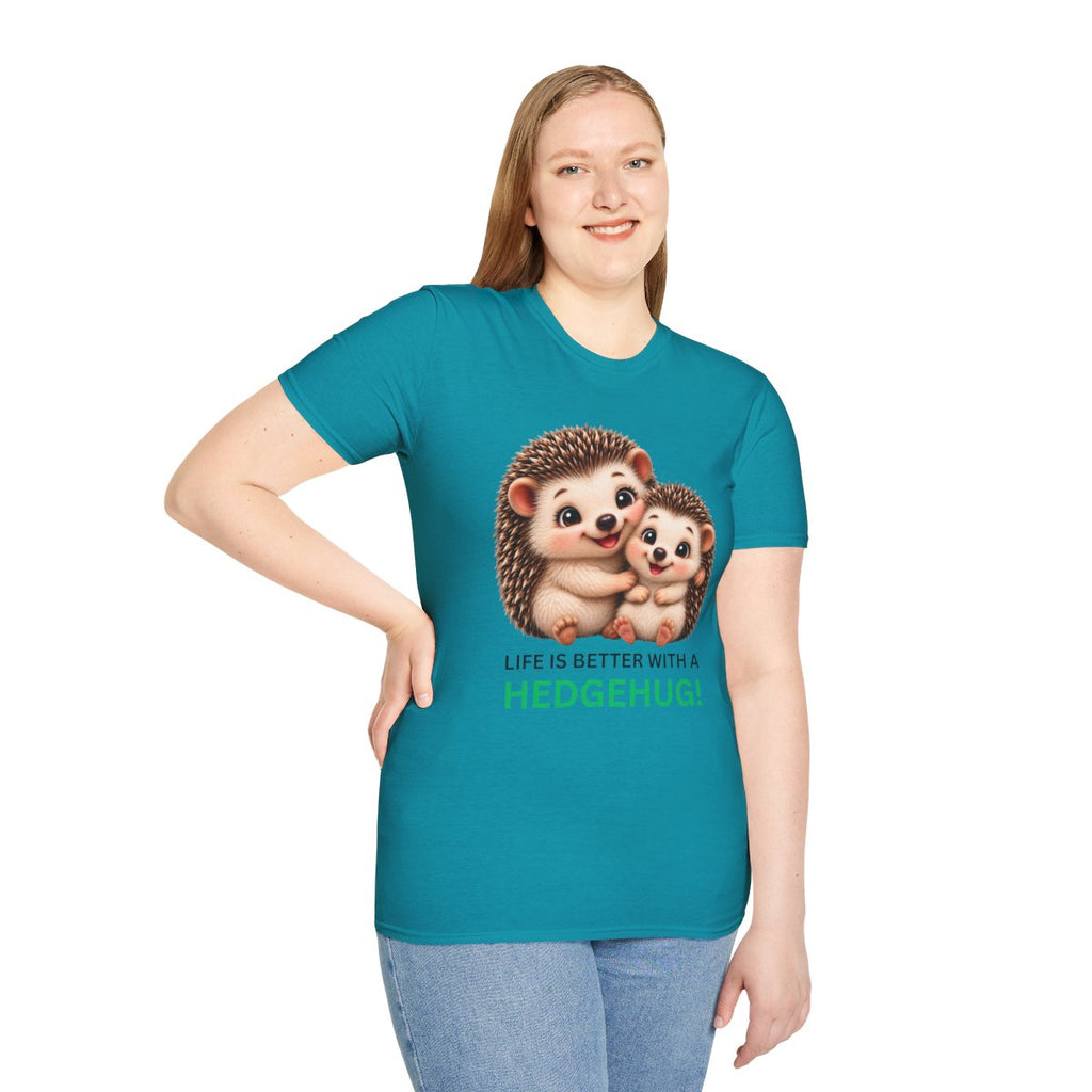 A woman modeling a teal short-sleeve t-shirt with a graphic of two hedgehogs and the text 'LIFE IS BETTER WITH A HEDGEHUG!'.