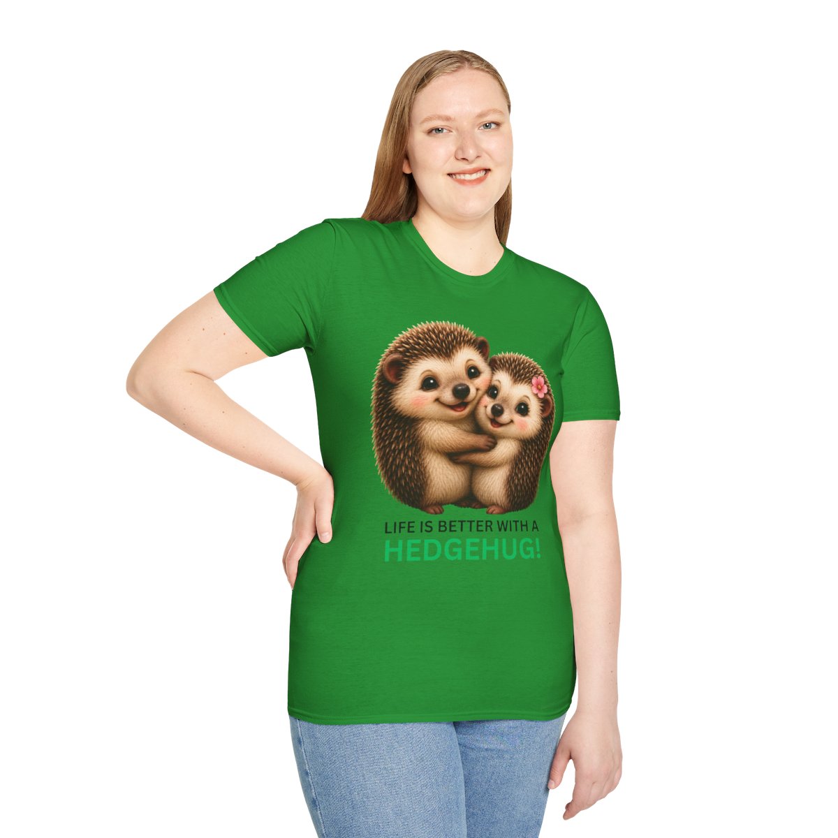 A woman modeling a bright green short-sleeve t-shirt with a graphic of two hugging hedgehogs and the text 'LIFE IS BETTER WITH A HEDGEHUG!' on the front, set against a plain white background.